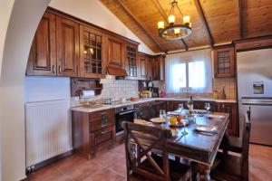 Kuchyň nebo kuchyňský kout v ubytování Nicolas Beach House