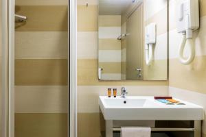 A bathroom at Residence Osoppo