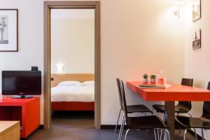 A bed or beds in a room at Residence Osoppo