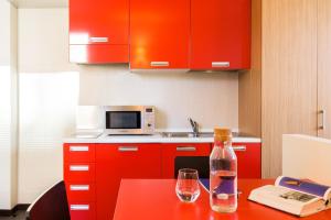 A kitchen or kitchenette at Residence Osoppo