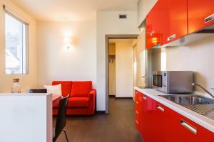 A kitchen or kitchenette at Residence Osoppo