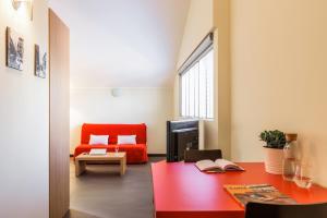 A seating area at Residence Osoppo