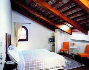 Postel nebo postele na pokoji v ubytování Hotel Due Mori + 35 fotografií