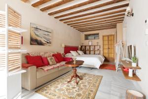 Posteľ alebo postele v izbe v ubytovaní Hotel Casa de las Cuatro Torres