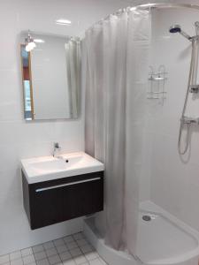 Koupelna v ubytování Kaunis Guesthouse + 24 fotografií