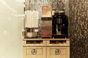 a display case in a store with products on it at Beauty Hotels Taipei - Hotel Bfun in Taipei