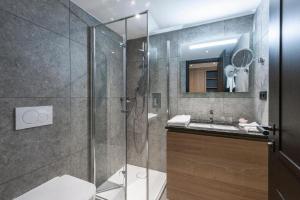 Koupelna v ubytování Gasthaus - Hotel FUCHS + 23 fotografií