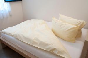 Postel nebo postele na pokoji v ubytování Hotel Credé