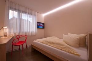 Postel nebo postele na pokoji v ubytování Hotel Credé
