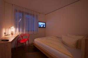 Postel nebo postele na pokoji v ubytování Hotel Credé