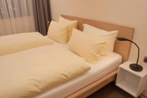 Postel nebo postele na pokoji v ubytování Hotel Credé