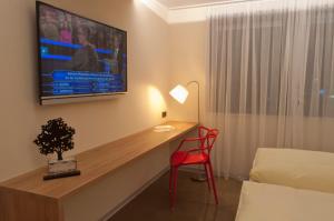TV a/nebo společenská místnost v ubytování Hotel Credé