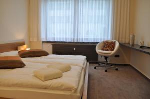 Postel nebo postele na pokoji v ubytování Hotel Credé