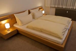 Postel nebo postele na pokoji v ubytování Hotel Credé