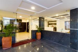 The lobby or reception area at Sanctum Suites Whitefield Bangalore