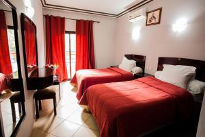 Postel nebo postele na pokoji v ubytování Residence Hotel Assounfou + 23 fotografií