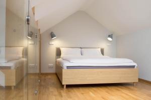 Posteľ alebo postele v izbe v ubytovaní Apartamenty Na Szczycie z balkonem - Dream Apart