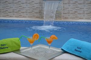 Bazén v ubytovaní Apartments Villa Holiday alebo v jeho blízkosti