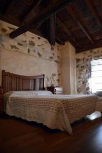 Voodi või voodid majutusasutuse Casa Rural El Molino I toas