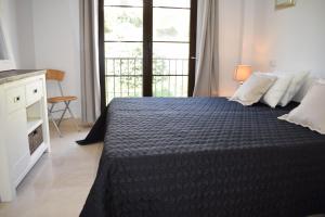 Postel nebo postele na pokoji v ubytování Penthouse Montaña + 13 fotografií