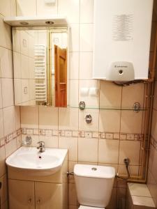 Ванная комната в Apartament w Centrum