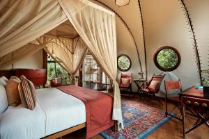 Llit o llits en una habitació de Wild Coast Tented Lodge All Inclusive