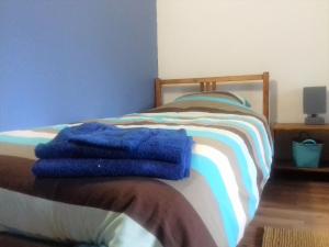 Postel nebo postele na pokoji v ubytování La ferme de Bertogne