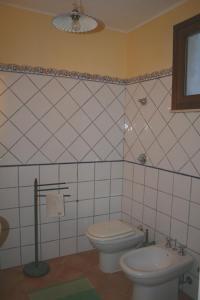 Kúpeľňa v ubytovaní Villa Lisca Blu
