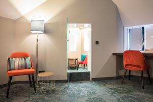 Posezení v ubytování Hotel de Koppelpaarden