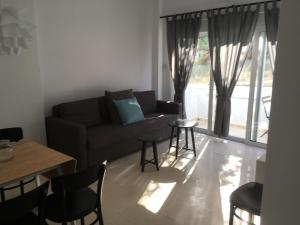 Posezení v ubytování Helios Studios & Apartments