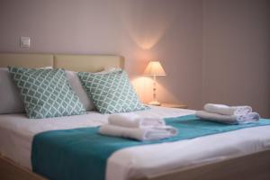 Postel nebo postele na pokoji v ubytování Magnolia Rooms