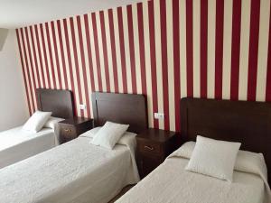 Postel nebo postele na pokoji v ubytování Hotel Rural Nova Ruta