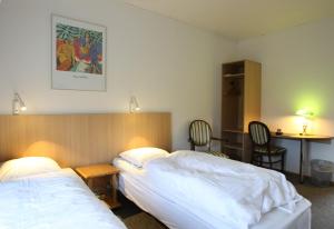 Letto o letti in una camera di Hotel Bov Kro