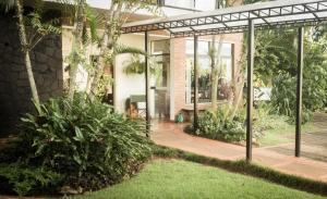 Sodas prie apgyvendinimo įstaigos Las Orquideas Parque Hotel