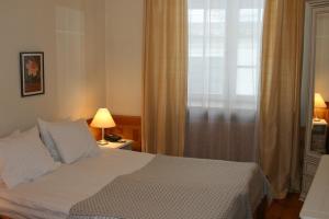 Letto o letti in una camera di Boutique Hotel KRISTOFS