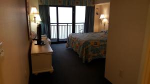 Postel nebo postele na pokoji v ubytování JeffsCondos - 3 Bedroom - Breakers Resort + 37 fotografií