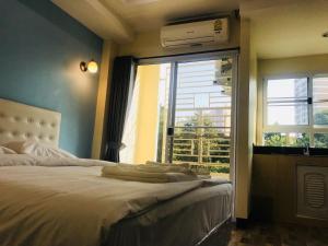 Ένα ή περισσότερα κρεβάτια σε δωμάτιο στο SAB Residence +26 φωτογραφίες