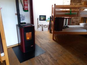 En eller flere senge i et værelse på Albergue a Casina di Marcello