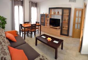 Apartamentos Sevilla tesisinde bir oturma alanı