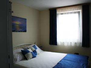 A bed or beds in a room at Apartment Azriel
