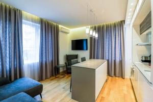 TV/trung tâm giải trí tại Grand Apartment
