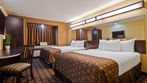 Postel nebo postele na pokoji v ubytování Microtel Inn & Suites by Wyndham Round Rock