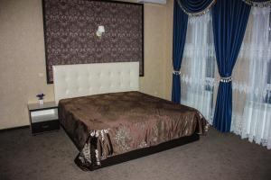 Voodi või voodid majutusasutuse Гостиница Браво toas