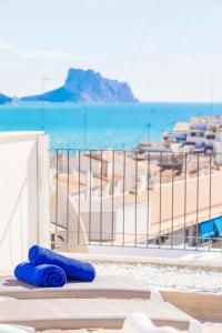 a view of the beach from the balcony of a resort at Atico Vistas al Mar, Terraza, Piscina y Parking by Vero in Altea