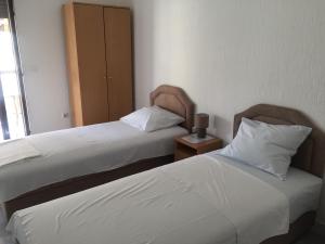 Postel nebo postele na pokoji v ubytování Guest House Bajceta