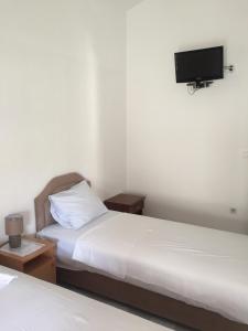 Postel nebo postele na pokoji v ubytování Guest House Bajceta