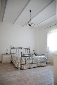 A bed or beds in a room at Villa Elvira