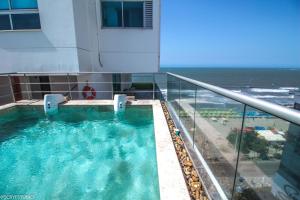 Bazén v ubytovaní Magnífico apto de 1 habitación con vista inmejorable al mar en Bocagrande alebo v jeho blízkosti