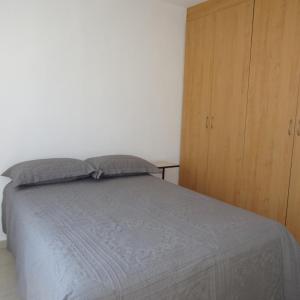 En eller flere senge i et værelse på Casa Libertad + 2 billeder