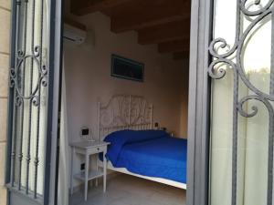 Postel nebo postele na pokoji v ubytování B&B Corte Preare